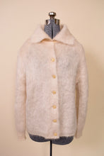 Load image into Gallery viewer, Cream Mohair Fuzzy Knit Cardigan By Jaeger. Pictured from front.
