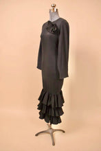 Load image into Gallery viewer, Black Cotton Ruffle Maxi Dress by Arpeja pictured from the side.
